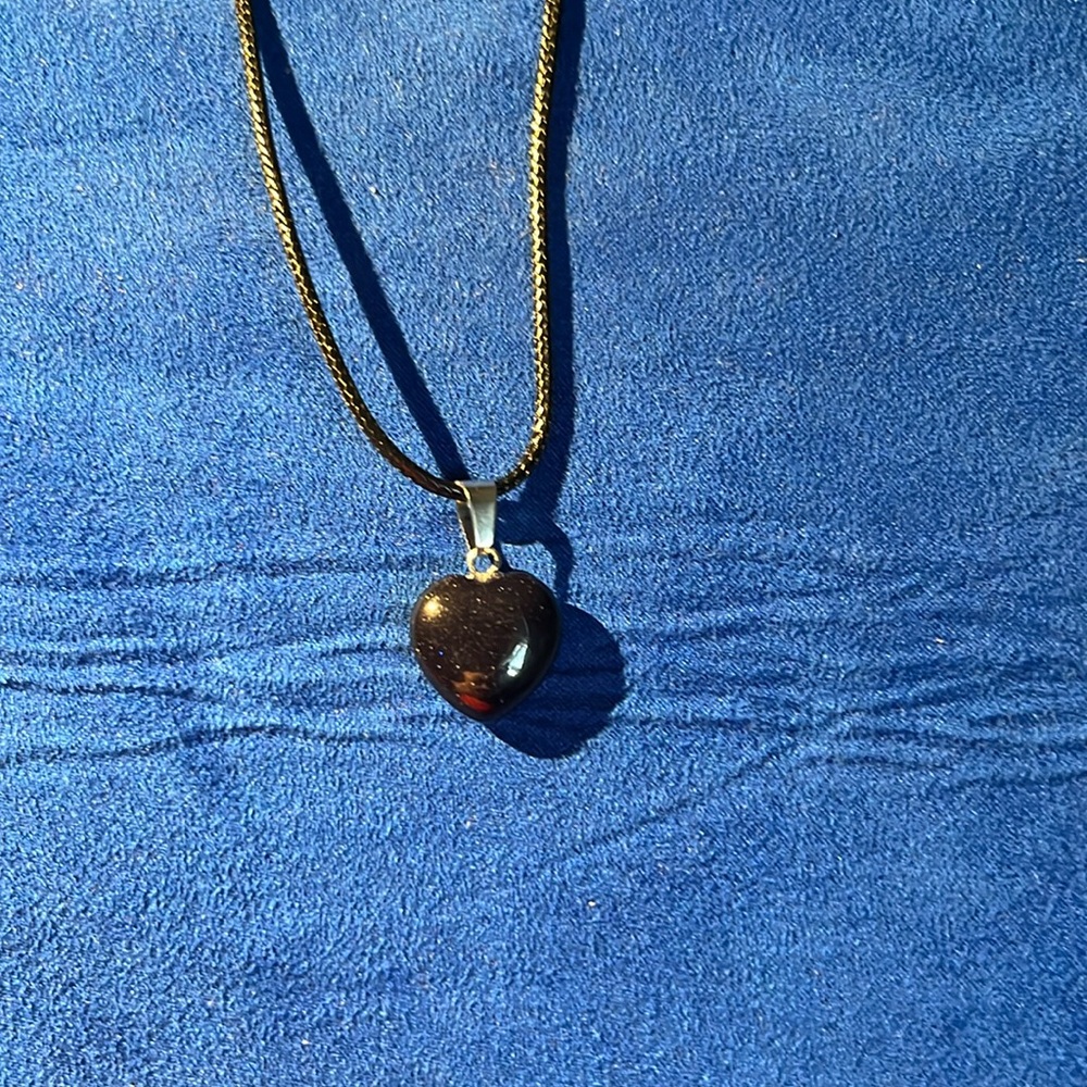 Black sparkly‎ hart pendant necklace.